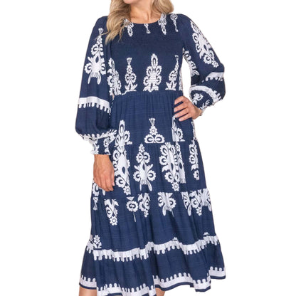 Whisper Midi Dress in Navy, available at: https://www.daltik.com/