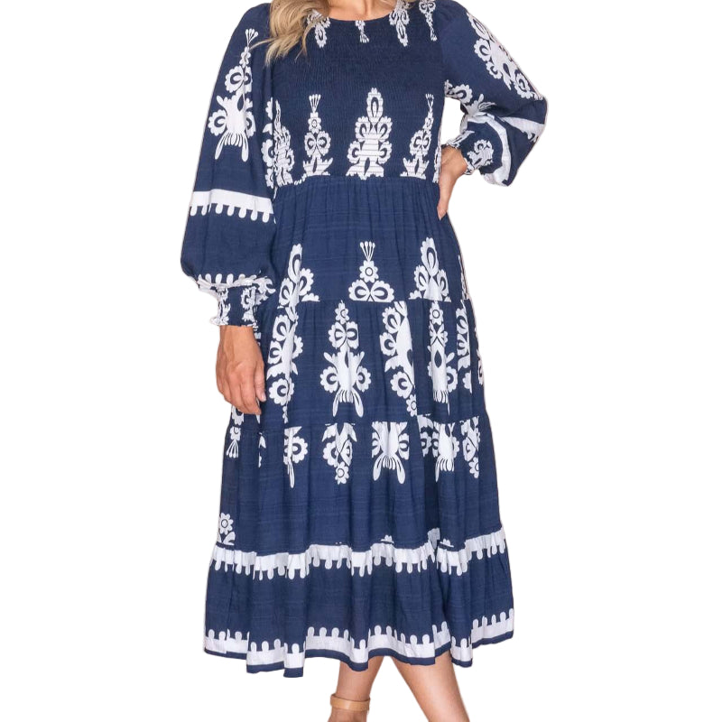Whisper Midi Dress in Navy, available at: https://www.daltik.com/