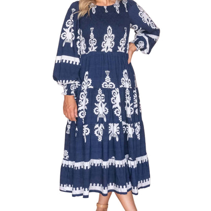 Whisper Midi Dress in Navy, available at: https://www.daltik.com/