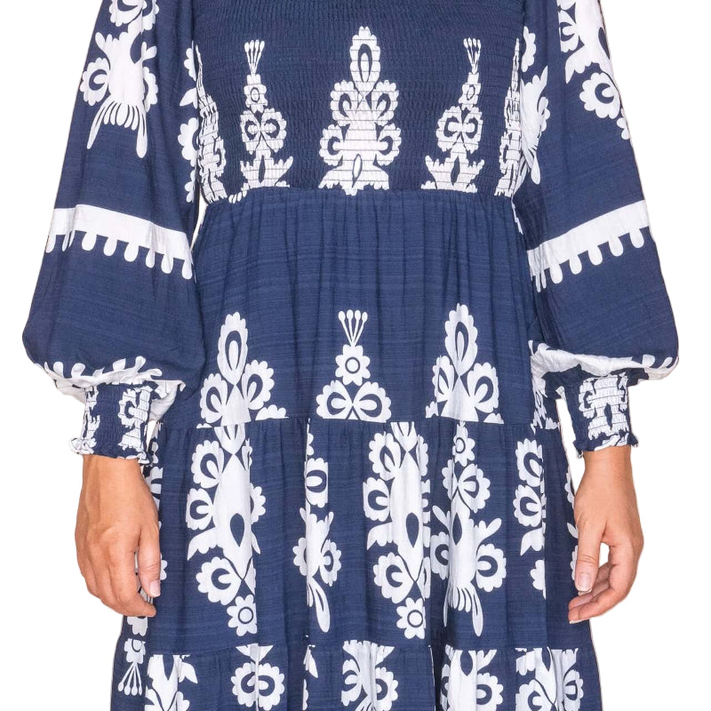 Whisper Midi Dress in Navy, available at: https://www.daltik.com/