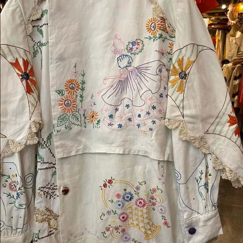 Handmade White Embroidered Patchwork Cotton Blouse, available at: https://www.daltik.com/