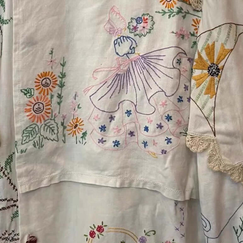Handmade White Embroidered Patchwork Cotton Blouse, available at: https://www.daltik.com/